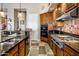 Well-equipped kitchen with gas cooktop and ample counter space at 10821 E Tusayan Trl, Scottsdale, AZ 85255
