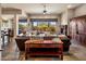 Open living space with leather furniture and fireplace at 10821 E Tusayan Trl, Scottsdale, AZ 85255
