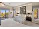 Bright main bedroom with a metal bed frame and large windows at 10821 E Tusayan Trl, Scottsdale, AZ 85255
