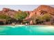 Relaxing pool and spa area nestled against dramatic rock formations at 10821 E Tusayan Trl, Scottsdale, AZ 85255