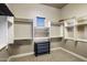 Large walk-in closet with ample shelving and hanging space at 10821 E Tusayan Trl, Scottsdale, AZ 85255