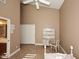 Bright bedroom with double door closet and ceiling fan at 23307 N 71St Dr, Glendale, AZ 85310