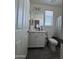 Simple bathroom with white vanity and toilet at 2540 N 149Th Ave, Goodyear, AZ 85395