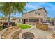 Backyard with patio, hot tub, and built-in grill at 321 S 172Nd Dr, Goodyear, AZ 85338