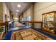 Elegant community hallway with carpet and display case at 6097 S Pinehurst Dr, Chandler, AZ 85249