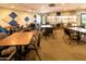 Community room with tables and chairs, perfect for events at 6097 S Pinehurst Dr, Chandler, AZ 85249