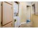 Stackable washer and dryer in a well-lit laundry closet at 6097 S Pinehurst Dr, Chandler, AZ 85249