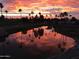 Scenic sunset view over the lake at 6097 S Pinehurst Dr, Chandler, AZ 85249