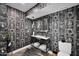 Unique bathroom with black and white wallpaper and modern vanity at 6701 N Scottsdale Rd # 24, Scottsdale, AZ 85250