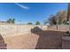 Landscaped backyard with gravel and block wall at 7318 W Greer Ave, Peoria, AZ 85345