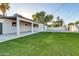 Spacious backyard with artificial turf and covered patio at 7538 E Garfield St, Scottsdale, AZ 85257