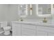 Modern bathroom with double vanity and marble countertops at 7538 E Garfield St, Scottsdale, AZ 85257