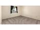 Simple bedroom with neutral walls and carpet flooring at 7950 E Keats Ave # 150, Mesa, AZ 85209