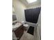 Bathroom with tub shower, toilet, and vanity at 821 W Kachina Trl, Phoenix, AZ 85040