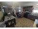 Kitchen with dark brown cabinets and tile flooring at 821 W Kachina Trl, Phoenix, AZ 85040