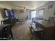 Spacious living room features a large TV and comfortable seating at 821 W Kachina Trl, Phoenix, AZ 85040