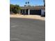 Single-story home with a two-car garage and landscaped front yard at 9021 N 64Th Ave, Glendale, AZ 85302