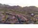 Community nestled in mountains with golf course nearby at 10843 E La Junta Rd, Scottsdale, AZ 85255