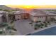 Beautiful home with a brick driveway and desert landscaping at 10843 E La Junta Rd, Scottsdale, AZ 85255