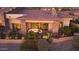 Luxury home with a large patio and desert landscaping at 10843 E La Junta Rd, Scottsdale, AZ 85255