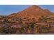 Gated community entrance with beautifully landscaped grounds at 10843 E La Junta Rd, Scottsdale, AZ 85255