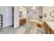 Luxurious bathroom with double vanity and a large tub at 10843 E La Junta Rd, Scottsdale, AZ 85255