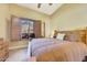 Bright bedroom with mountain views and wooden furniture at 10843 E La Junta Rd, Scottsdale, AZ 85255
