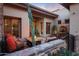 Relaxing courtyard with fire pit, seating, and water feature at 10843 E La Junta Rd, Scottsdale, AZ 85255