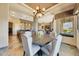 Bright dining area with a round table and scenic views at 10843 E La Junta Rd, Scottsdale, AZ 85255