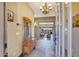 Inviting entryway with a wooden bench and view to the living room at 10843 E La Junta Rd, Scottsdale, AZ 85255