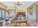 Spacious living room with stone accents and comfortable seating at 10843 E La Junta Rd, Scottsdale, AZ 85255