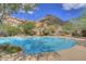 Inviting community pool area with mountain backdrop at 10843 E La Junta Rd, Scottsdale, AZ 85255