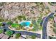 Community pool surrounded by desert landscape at 10843 E La Junta Rd, Scottsdale, AZ 85255