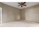 Spacious bedroom with ceiling fan and carpet flooring at 15050 N Thompson Peak Pkwy # 2006, Scottsdale, AZ 85260