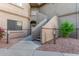 Exterior view of condo building showing walkway and stairs leading to individual unit entrance at 15050 N Thompson Peak Pkwy # 2006, Scottsdale, AZ 85260