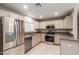 Modern kitchen features stainless steel appliances and granite countertops at 15050 N Thompson Peak Pkwy # 2006, Scottsdale, AZ 85260