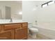 Clean bathroom with a tub, shower, and wood vanity at 2189 E 29Th Ave, Apache Junction, AZ 85119