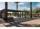 Outdoor picnic area with modern benches and pergola at 26107 N 23Rd Ave, Phoenix, AZ 85085