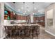 Modern kitchen with island, stainless steel appliances, and ample counter space at 28831 N 128Th Dr, Peoria, AZ 85383