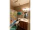Bathroom with shower/tub combo, wood vanity, and world map shower curtain at 333 E Redwood Ln, Phoenix, AZ 85048