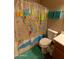 Bathroom with shower/tub combo and a world map shower curtain at 333 E Redwood Ln, Phoenix, AZ 85048
