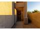 Front entry with a brown door, wreath, and stone pathway at 333 E Redwood Ln, Phoenix, AZ 85048