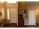 Bright and spacious entryway with hardwood floors and staircase at 333 E Redwood Ln, Phoenix, AZ 85048