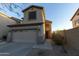Two-story house with attached garage and desert landscaping at 333 E Redwood Ln, Phoenix, AZ 85048