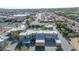 Aerial view of a community with a complex of townhouses, pool, and parking at 16616 E Palisades Blvd # 102, Fountain Hills, AZ 85268