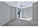 Bedroom with carpet, ceiling fan and sliding glass door at 16616 E Palisades Blvd # 102, Fountain Hills, AZ 85268