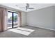 Bedroom with carpet, ceiling fan and sliding glass door at 16616 E Palisades Blvd # 102, Fountain Hills, AZ 85268