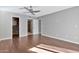 Bedroom with hardwood floors and access to bathroom at 16616 E Palisades Blvd # 102, Fountain Hills, AZ 85268