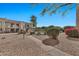 Community pool and surrounding landscaping with a pathway at 16616 E Palisades Blvd # 102, Fountain Hills, AZ 85268