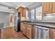 Kitchen with stainless steel appliances and wood cabinets at 16616 E Palisades Blvd # 102, Fountain Hills, AZ 85268